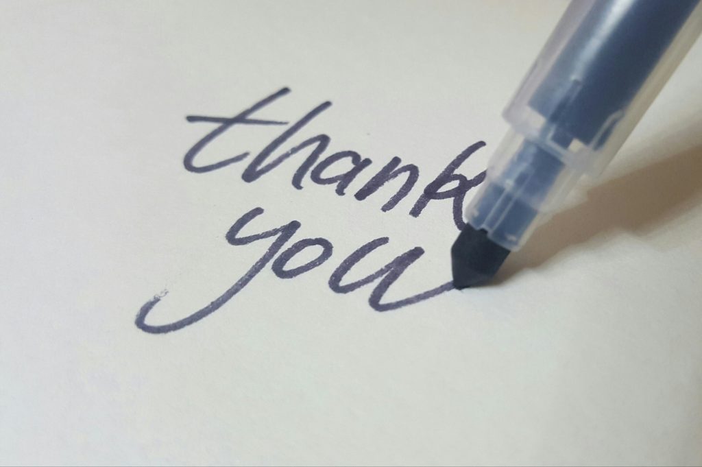 Thank you Schriftzug mit blauer Tinte